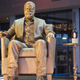 Image for article titled Nick Offerman, painted bronze, slowly sips Lagavulin at a Chicago Blackhawks game